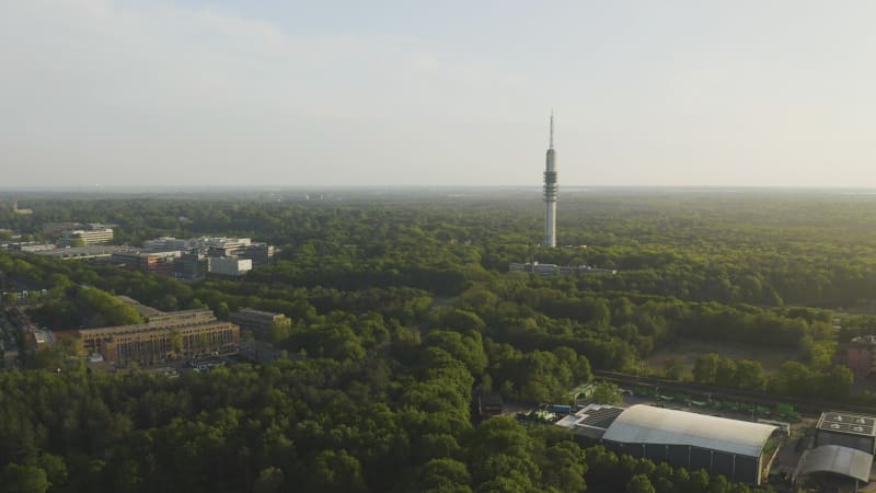 Aerial view of Hilversum TV Tower surrounded by forest