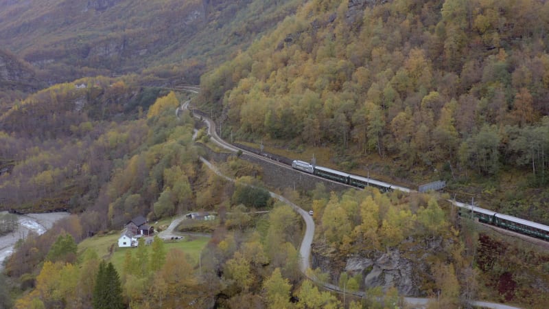 The Flam to Myrdal Train Passing Through Beautiful Landscapes