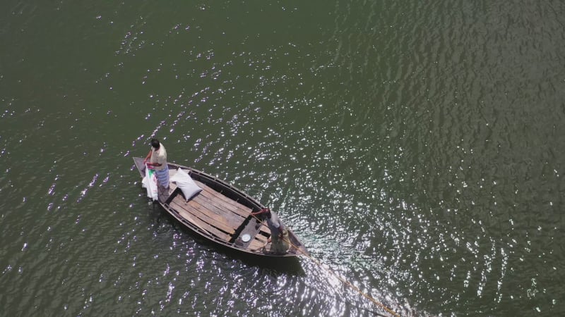 Aerial view of people sailing with traditional boats, Bangladesh.