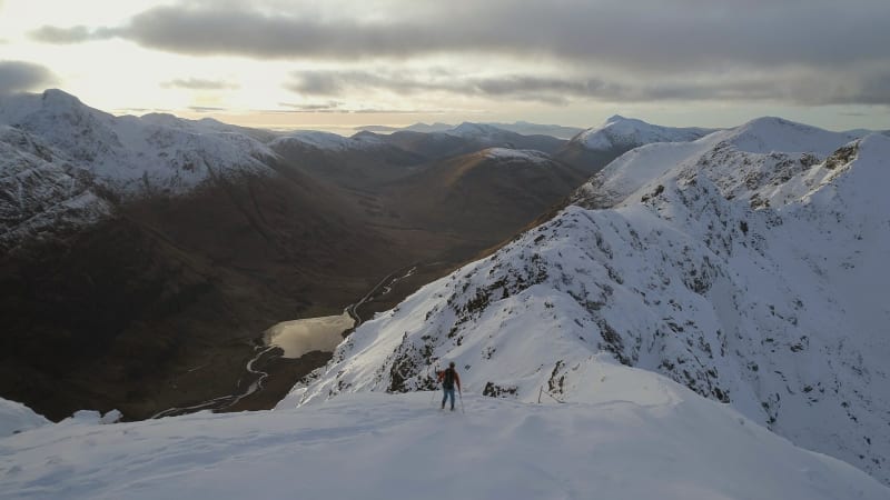 Mountain Climber and Snowy Ridge