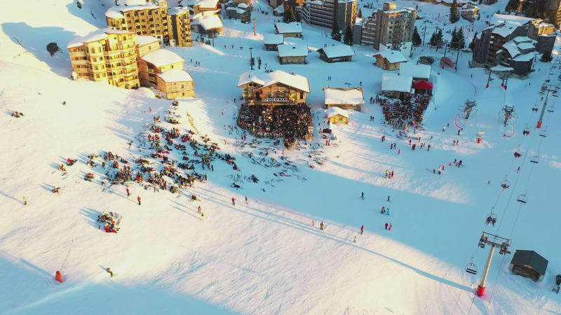 Aerial view of people resting in a ski resort, France.