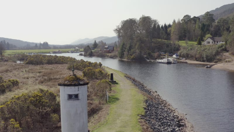 Head of a Loch in Scotland with a Small Lighthouse