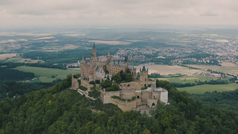 Aerial shot circling around stunning Hohenzollern castle in Germany