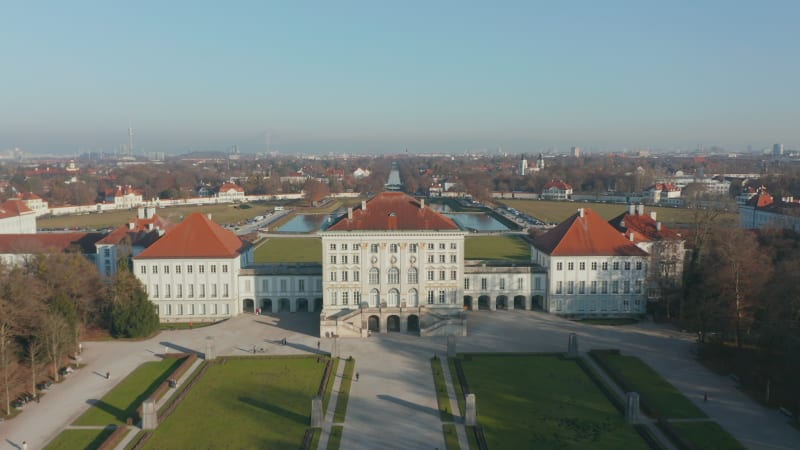 Aerial view of the beautiful Nymphenburg Palace Schloss Nymphenburg A famous and popular tourist attraction and sight in Munich. Amazing morning sunrise light.