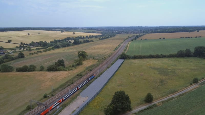 Fast Commuter Train Meandering Through the Countryside