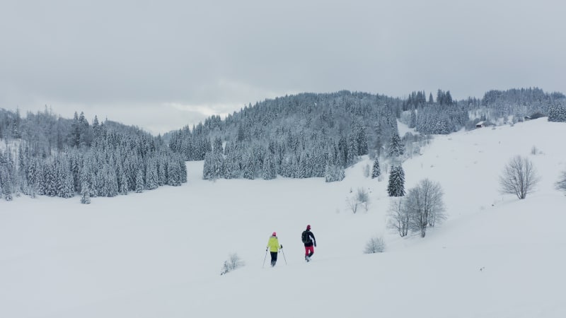 Aerial view of couple doing cross country ski in Onnion, France.