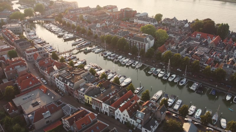 A water canal running through a residential area in Dordrecht, South Holland, Netherlands