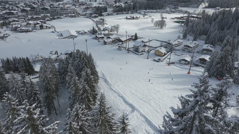 Flachau Village Aerial View with Skiers on the Slope