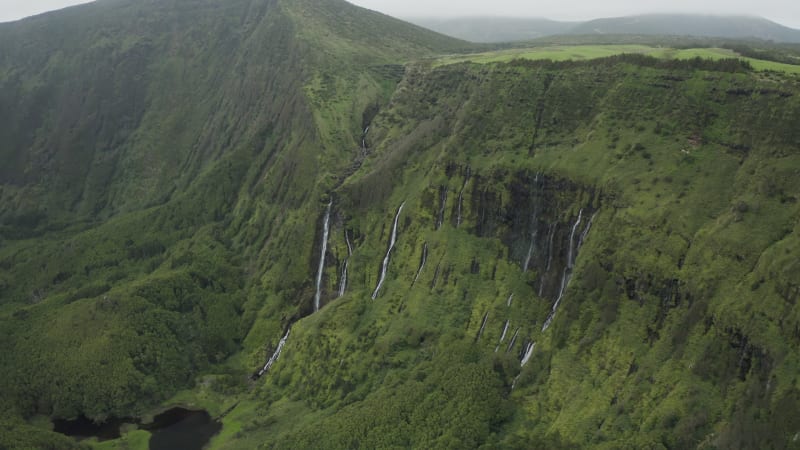 Aerial view of Caldeirao, a lake along the coastline on Corvo island, Azores islands, Portugal.