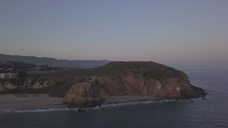 Malibu, California view of beach Shore Line Pacific ocean at sunset with mountain cliff, Aerial View