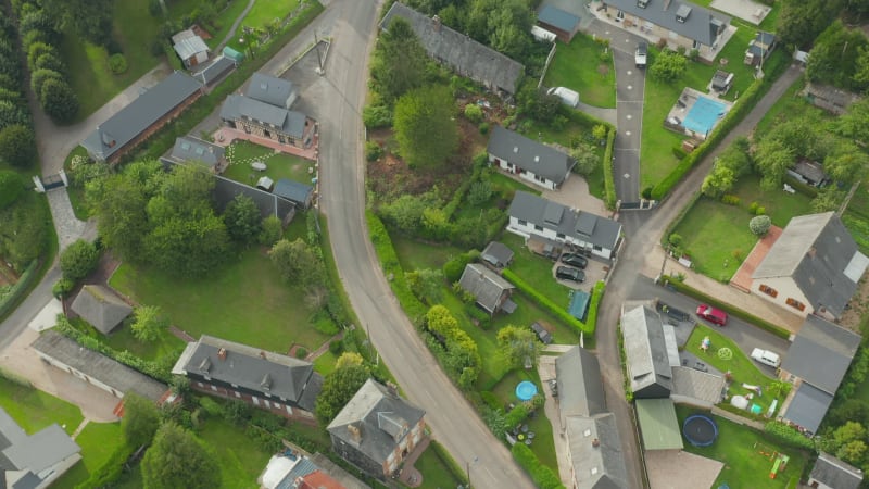 Overhead Aerial View of Cliff Coast in with Green grass in France, tilt down