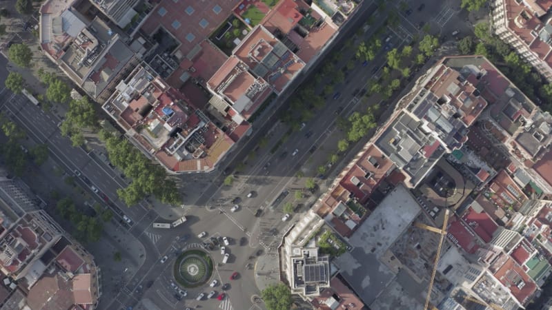 Time Lapse Aerial of Barcelona City Streets With Vehicles Amongst Buildings