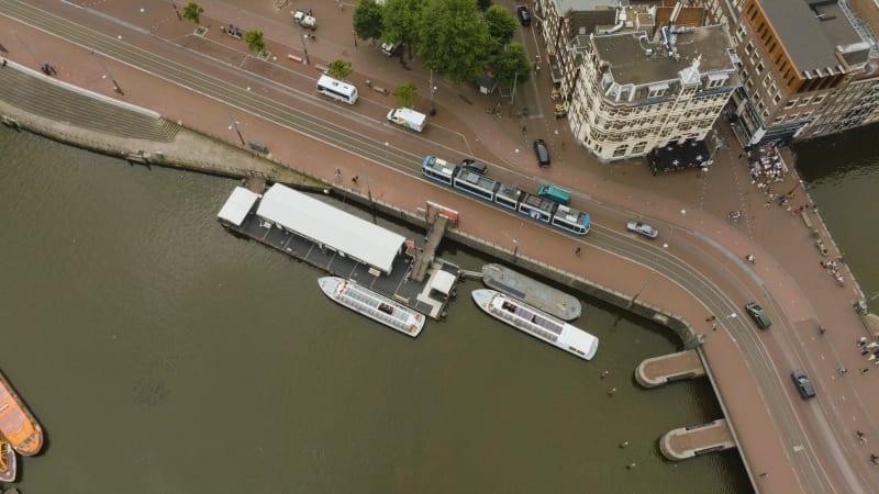 Overhead View of Tram Departing from Amsterdam Central Station