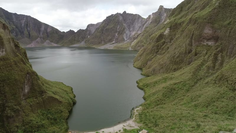 Aerial view of volcanic Lake Pinatubo and mountains, Porac.