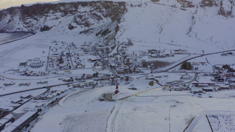 Vik Town and Church in Iceland with Ocean Views Seen From the Air