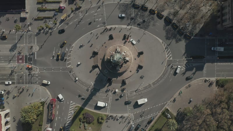 Overhead Shot of Columbus Monument Roundabout in Barcelona, Spain with Busy Car traffic on Sunny Day