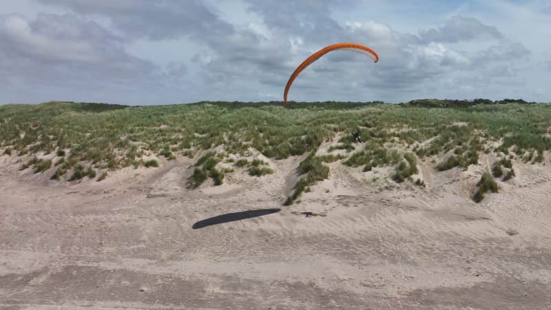 Paraglider Soaring Over Ouddorp Coastal Dunes