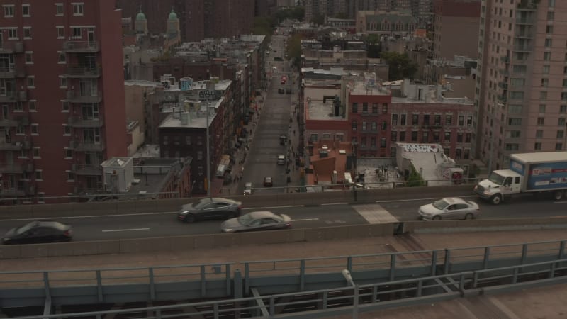 Low flight over highway, Bridge in Chinatown, New York City street