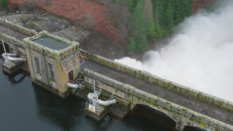 Water Being Pumped Through a Gravity Fed Hydroelectric Power Station Dam