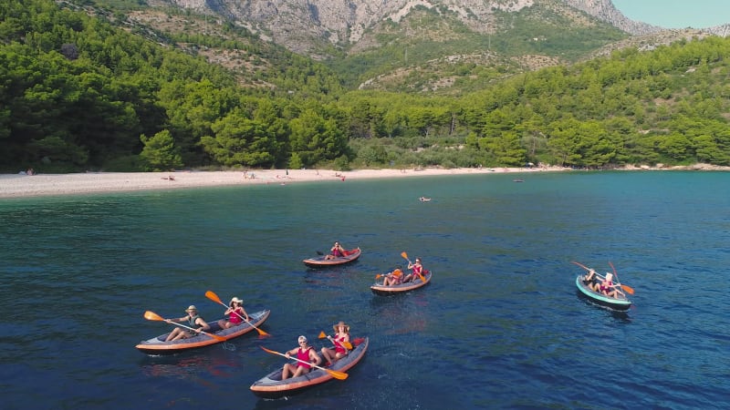 Aerial view of kayakers exploring Dalmatian coastline in Croatia