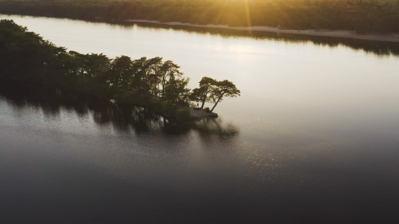 People relaxing on an island in the middle of the lake