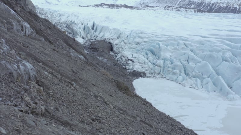 Photographer Exploring a Glacier in Iceland