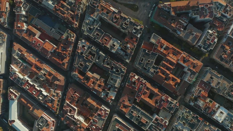 Aerial birds eye overhead top down view of apartment buildings blocks in town. Rooftop view of town development.