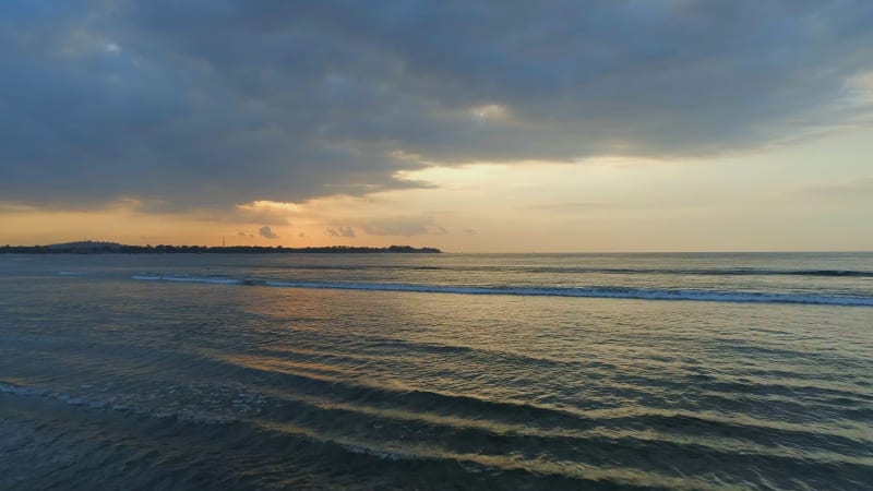 Beaches and Calm Waters in a Tropical Island Setting at Sunset