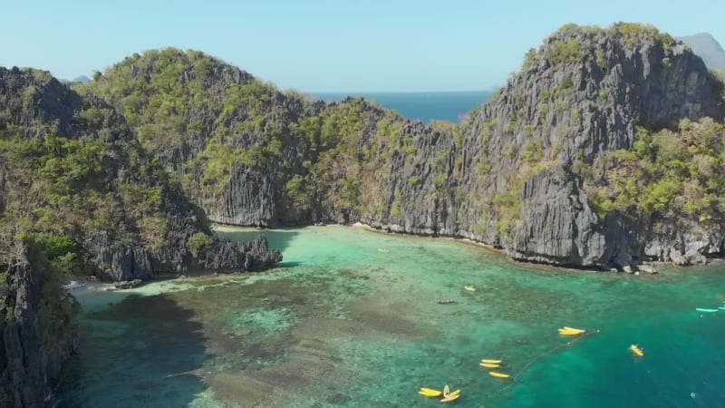 Aerial view of outrigger boats in Big Lagoon, El Nido