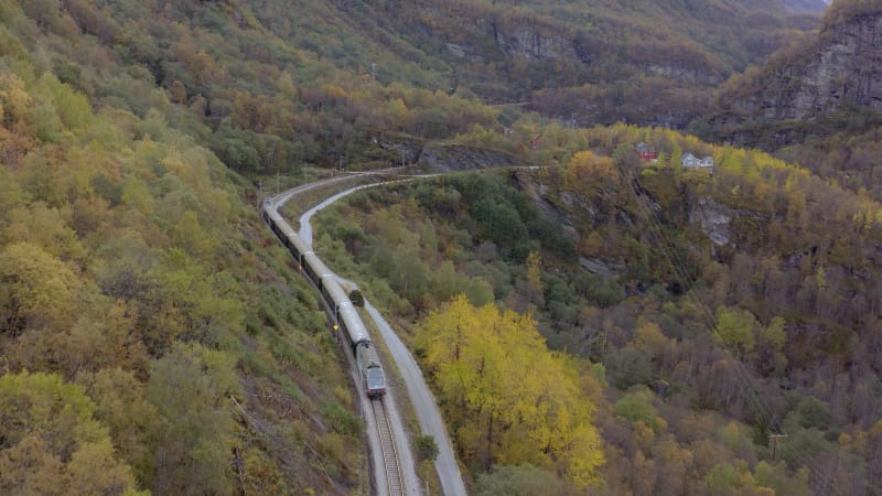 The Flam to Myrdal Train Passing Through Beautiful Landscapes