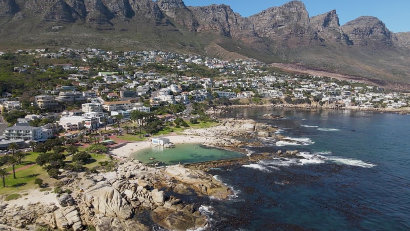 Aerial view of Camps Bay pool Lions Head mountain, Cape Town, South Africa.