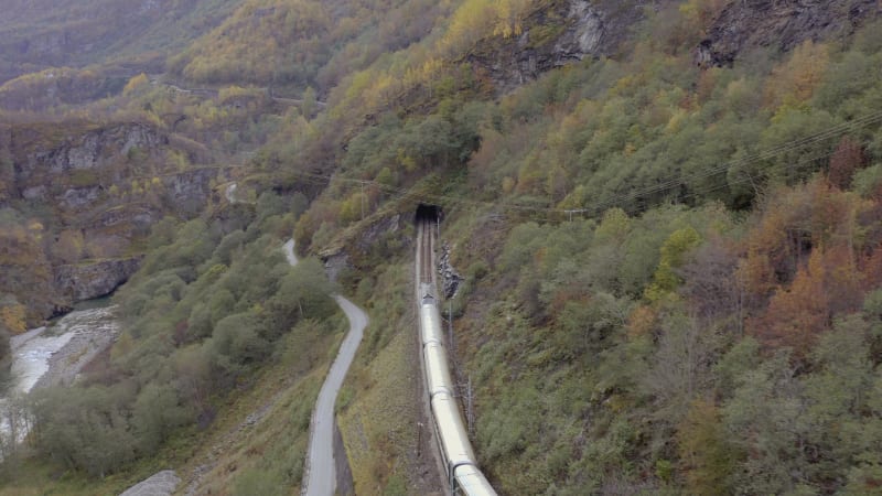 The Flam to Myrdal Train Passing Through Beautiful Landscapes