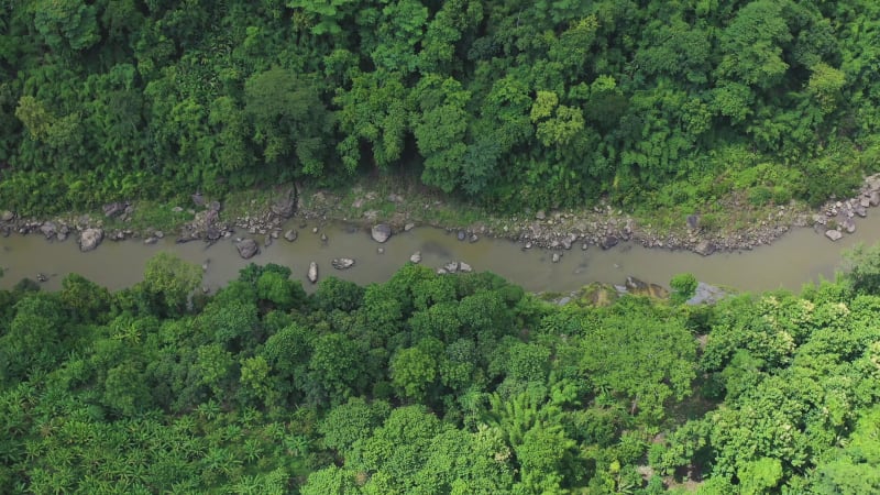 Aerial view of a river crossing the valley in Bandarban, Bangladesh.