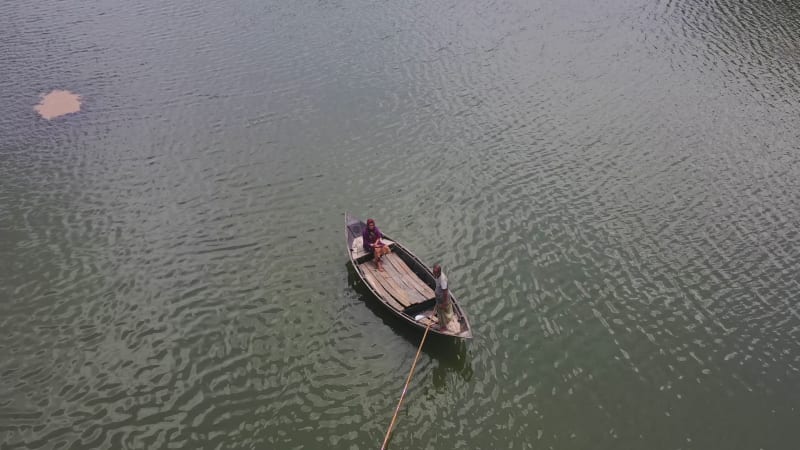 Aerial view of people sailing with traditional boats, Bangladesh.