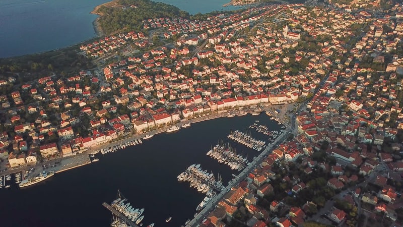 Aerial view of boats anchored at Mali Lošinj bay during the sunset.