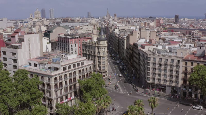 Busy Streets of Barcelona Spain With Church Bell