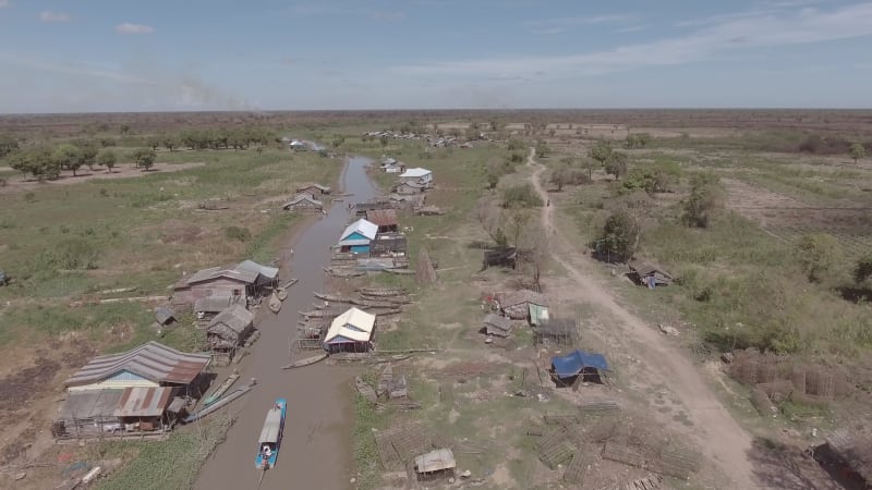 Aerial view of canal crossing between neighborhood, Tonle Sap.