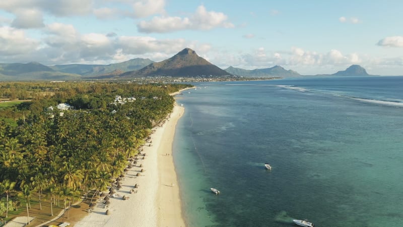 Aerial view of the coastline and the reef in Le Morne, Black River, Mauritius.