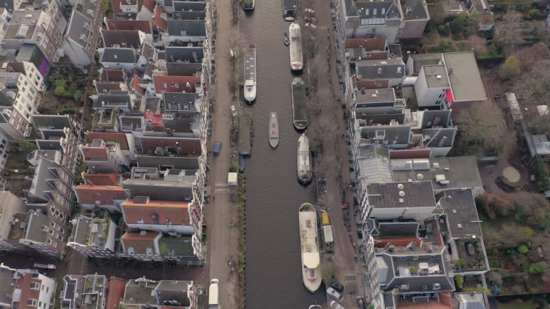 Canal Boat Tour in Amsterdam Amongst Riverside Houses