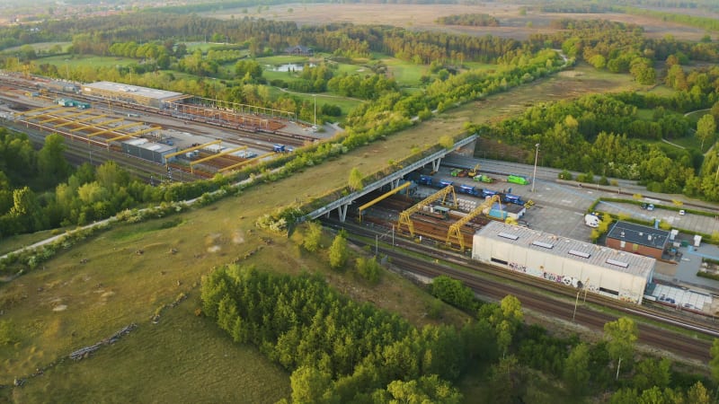 Green ecoduct bridge across industrial building facilities in Netherlands