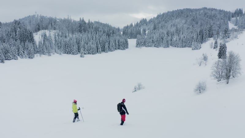 Aerial view of couple doing cross country ski in Onnion, France.