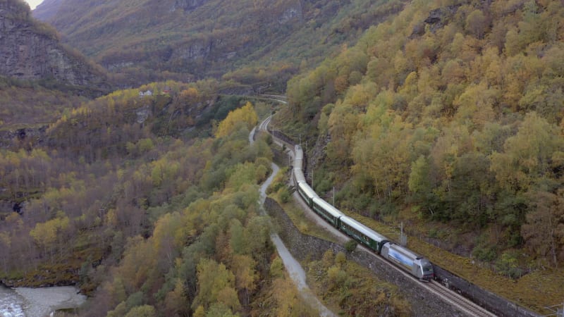 The Flam to Myrdal Train Passing Through Beautiful Landscapes