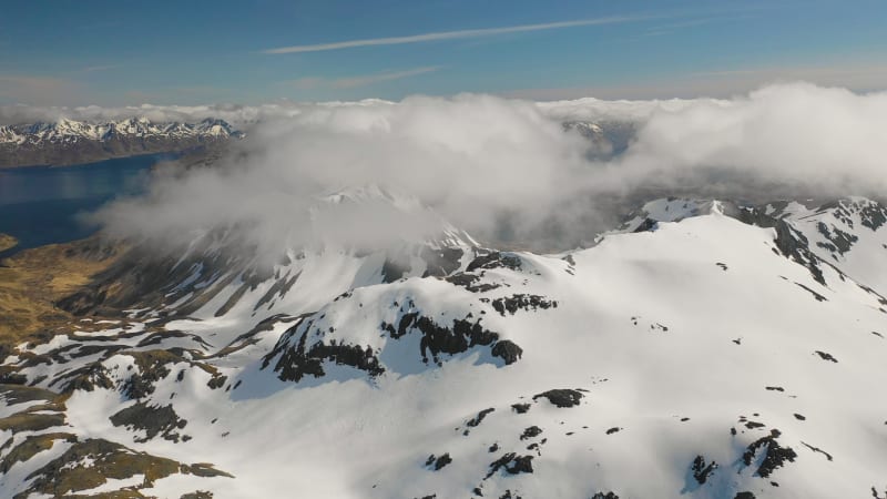 Aerial view of great snowy mountains in Alaska.