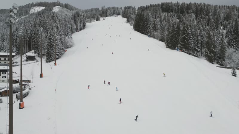 Skiers and Snowboarders at Flachau Ski Resort, Austria