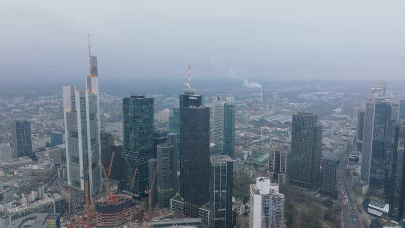 Financial and economic centre with modern high rise buildings with glass facades. Elevated view of downtown skyscrapers. Frankfurt am Main, Germany