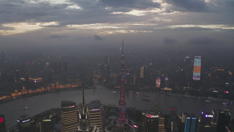 Aerial view of Shanghai skyline and financial district at sunset, China.