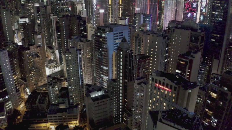 Aerial view of Hong Kong financial district at night.