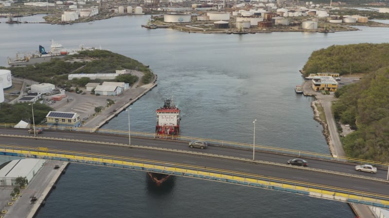 Industrial Ship Exiting Port with Carbon Emissions near Koningin Julianabrug