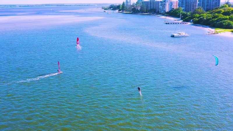 Aerial view of kitesurfing on a hydrofoil board, Queensland, Australia.