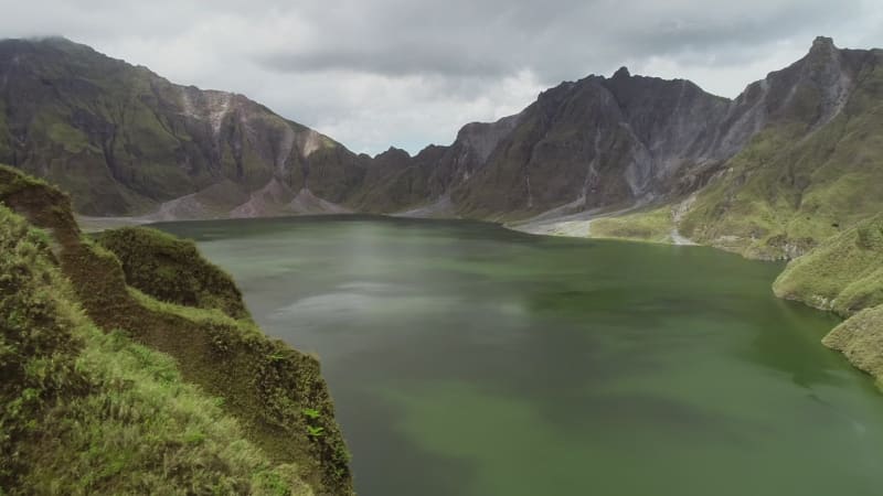 Aerial view of volcanic Lake Pinatubo and mountains, Porac.